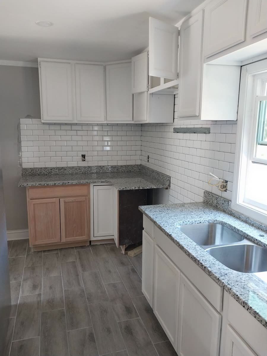 Granite countertops with an undermount sink installed by Aguilar Granite
